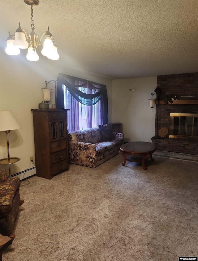 living room featuring carpet flooring, a fireplace, a textured ceiling, and a chandelier