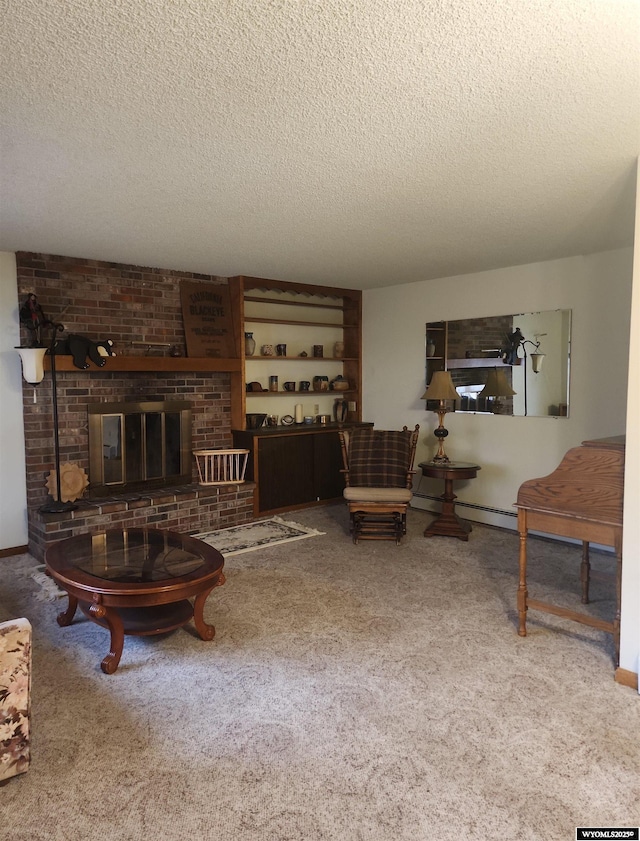 living room featuring carpet, a textured ceiling, and a fireplace