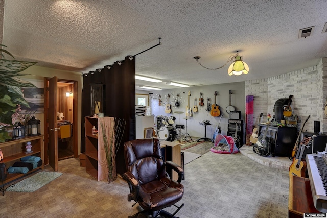 playroom featuring a wood stove, a textured ceiling, and light carpet