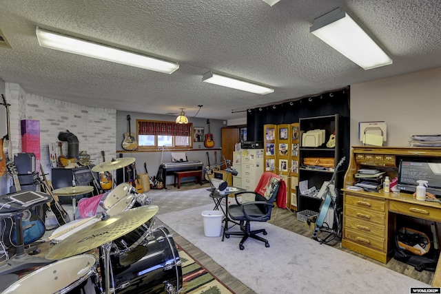 interior space with carpet flooring and a textured ceiling