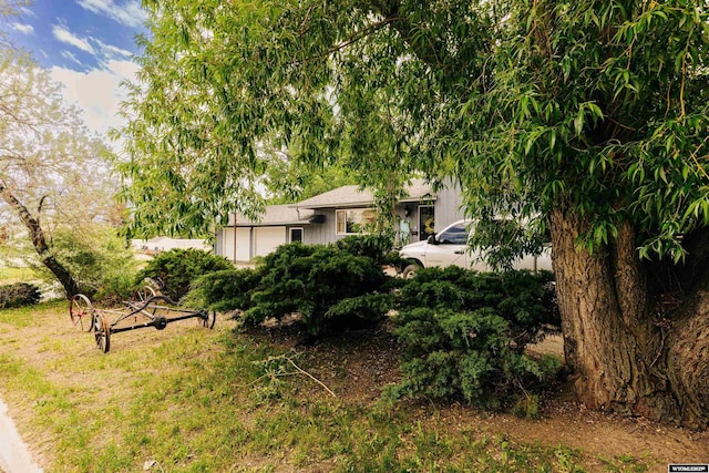 view of yard featuring a garage