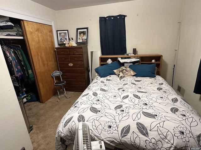 carpeted bedroom with a closet