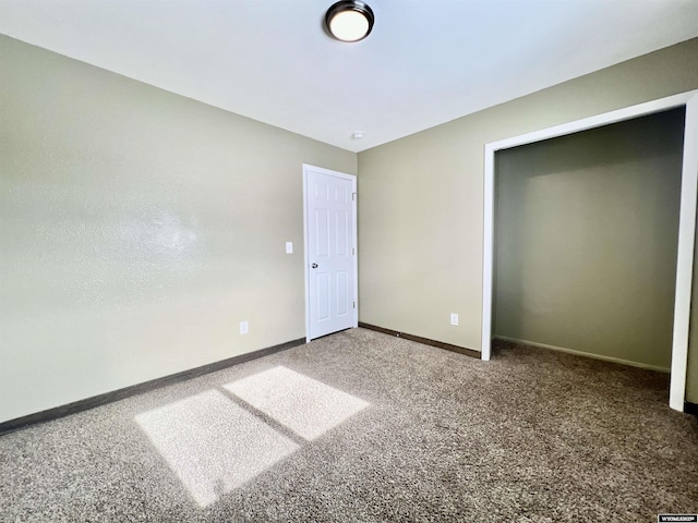 unfurnished bedroom with carpet