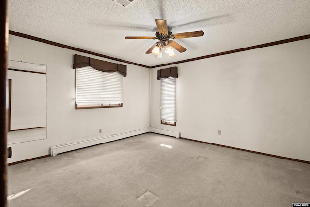 carpeted empty room with ceiling fan, a baseboard radiator, ornamental molding, and a textured ceiling