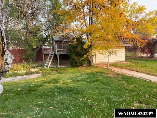 view of yard with a wooden deck