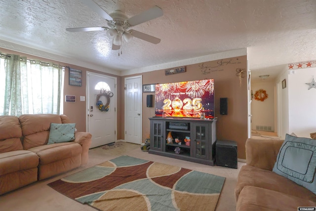 living room with light carpet, a textured ceiling, and ceiling fan