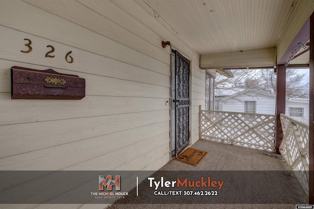 property entrance with a porch