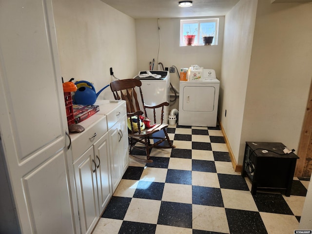 laundry area with cabinets and washer and dryer