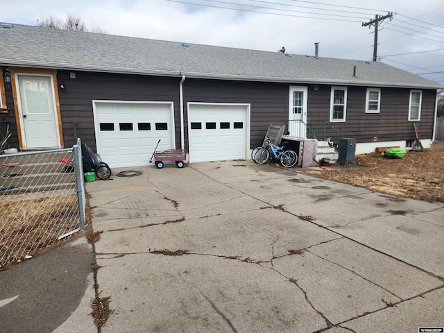 exterior space with a garage