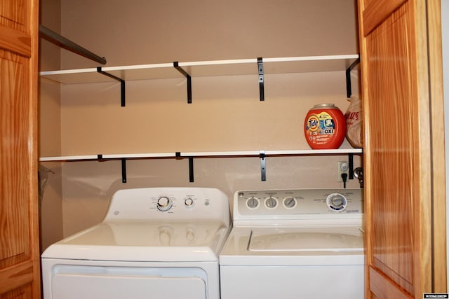 washroom featuring washer and dryer