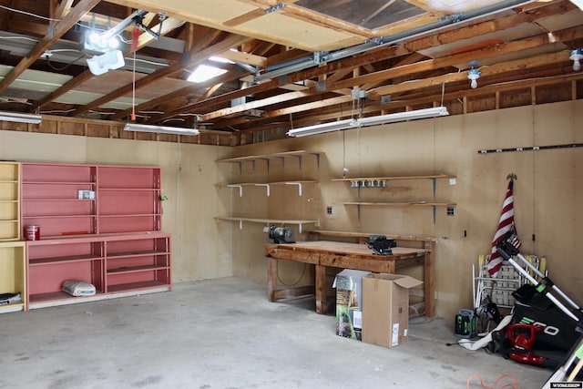 garage with a workshop area