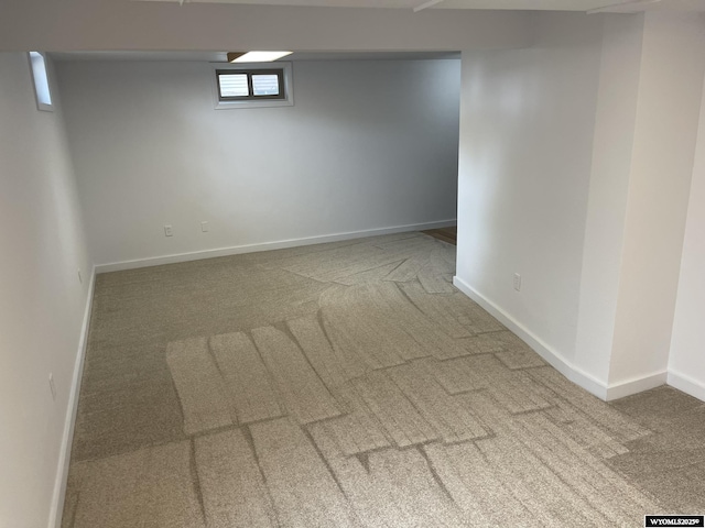 basement featuring carpet flooring