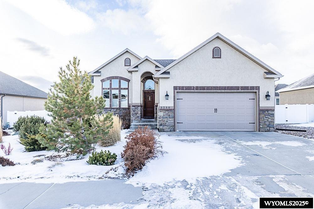 view of front of property with a garage