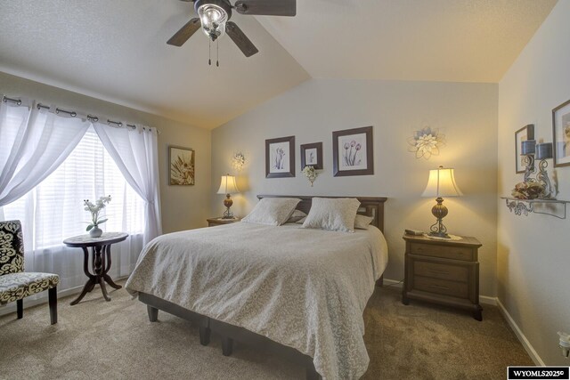 bedroom featuring carpet flooring, ceiling fan, and vaulted ceiling