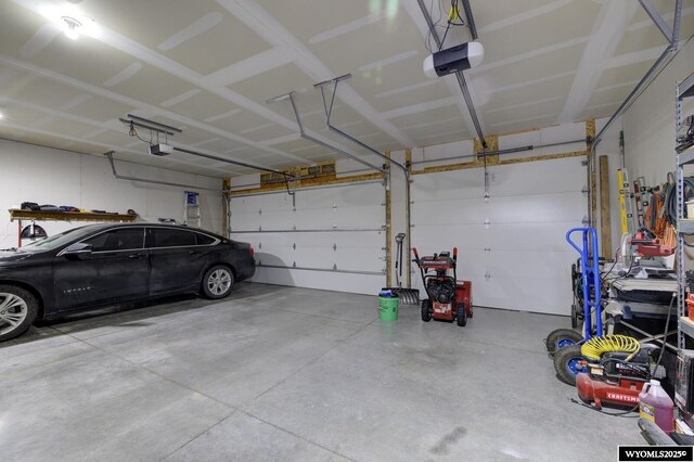 garage featuring a garage door opener