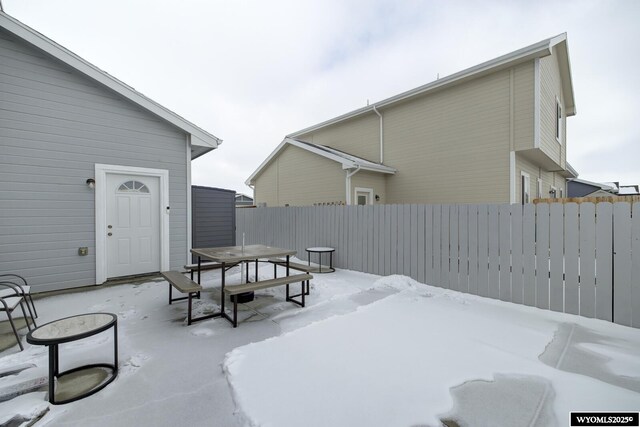 view of snow covered patio