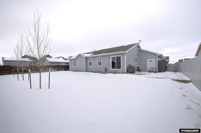 view of snow covered house