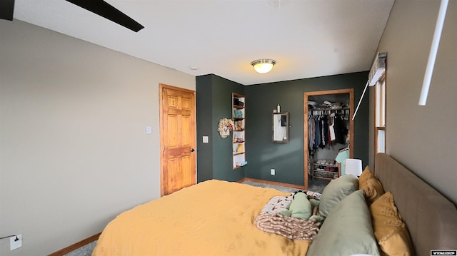 bedroom with carpet flooring and a closet