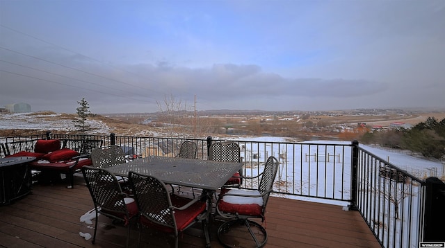 view of snow covered deck