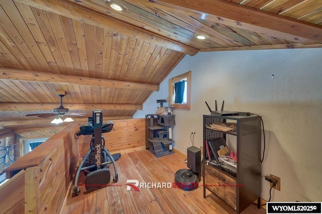 interior space with ceiling fan, hardwood / wood-style floors, wooden ceiling, and vaulted ceiling