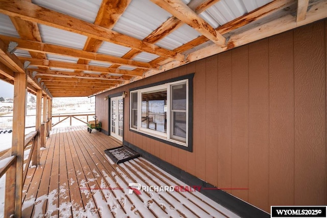 wooden terrace featuring french doors