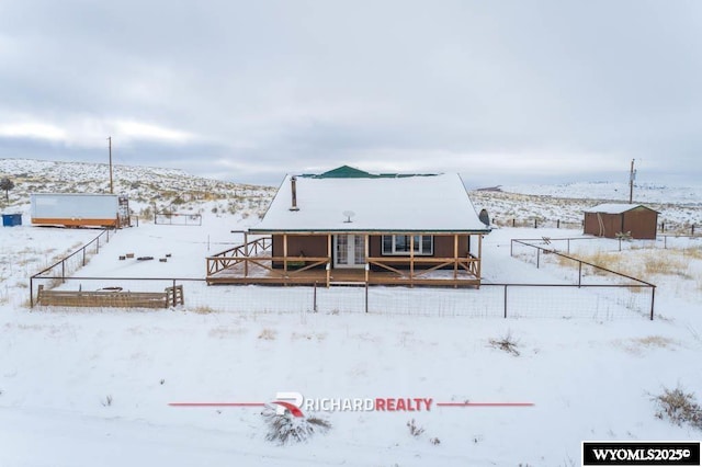 view of snow covered property