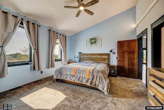 carpeted bedroom featuring ceiling fan and lofted ceiling