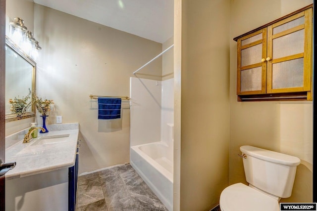 full bathroom featuring vanity, shower / bath combination, and toilet