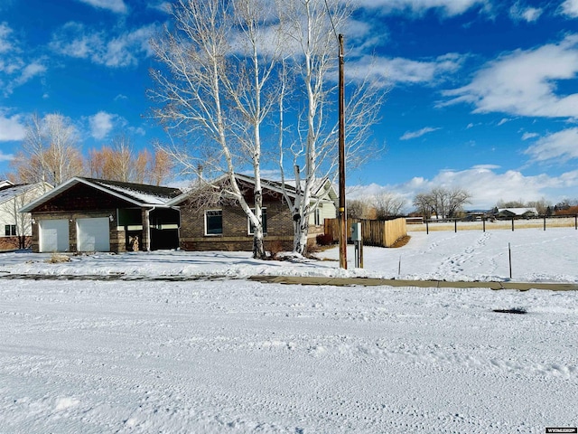 ranch-style home with a garage