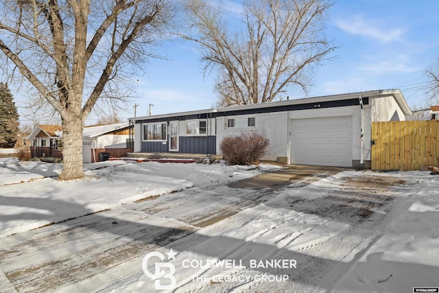 view of front of home featuring a garage