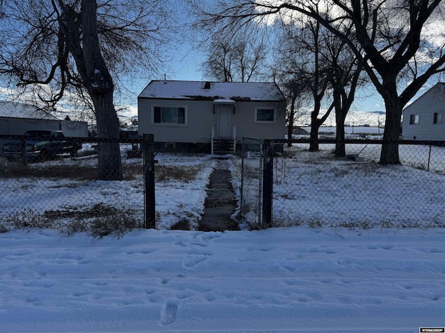 view of snow covered property