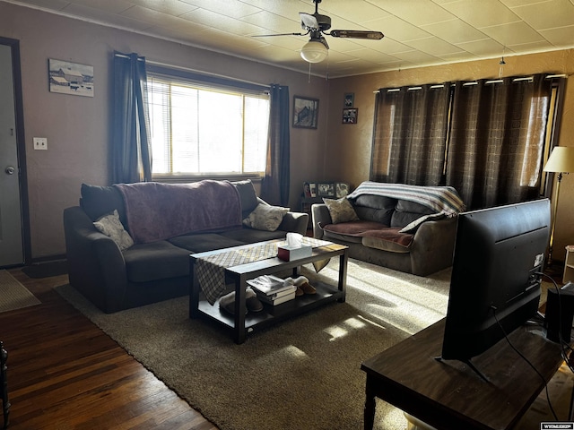 living room featuring hardwood / wood-style flooring and ceiling fan