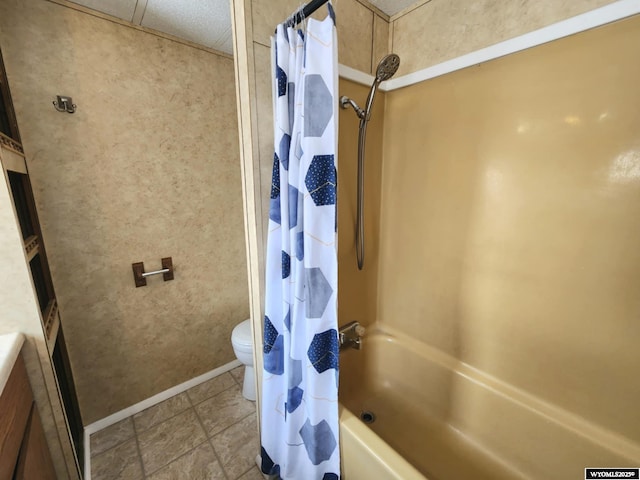 bathroom with shower / bath combo and toilet