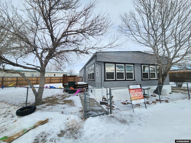 view of snow covered property