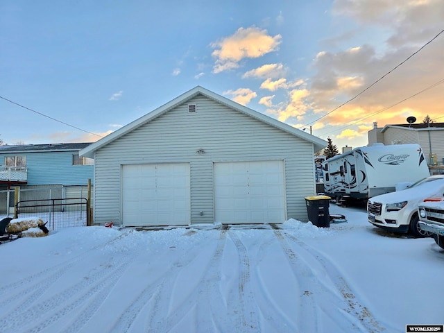 view of snow covered garage