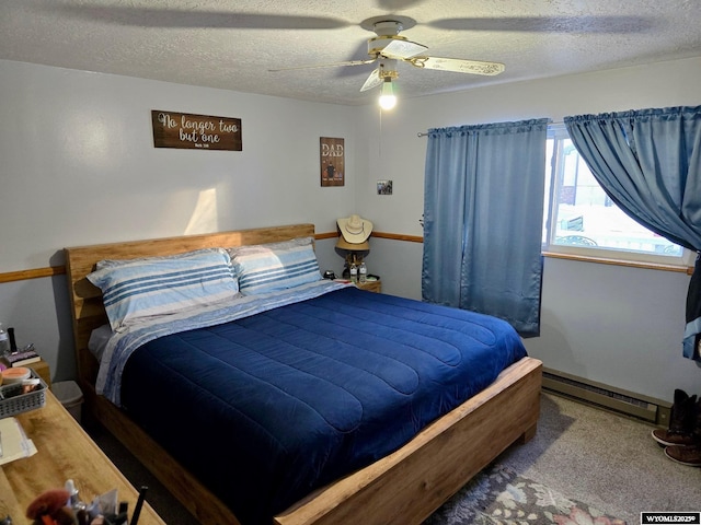 bedroom with baseboard heating, ceiling fan, carpet floors, and a textured ceiling