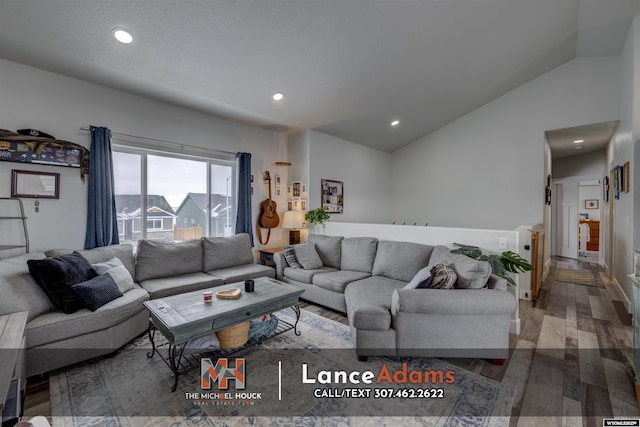 living area with lofted ceiling, wood finished floors, and recessed lighting