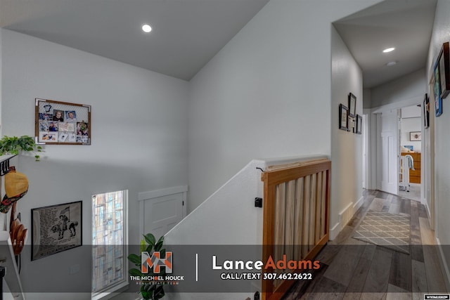 hallway featuring wood finished floors and recessed lighting