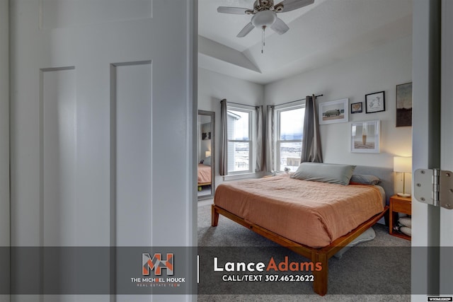 bedroom with lofted ceiling and carpet flooring