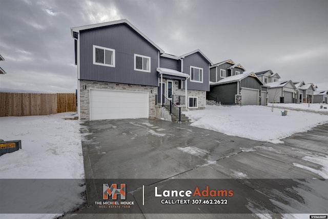 view of front of property featuring a garage