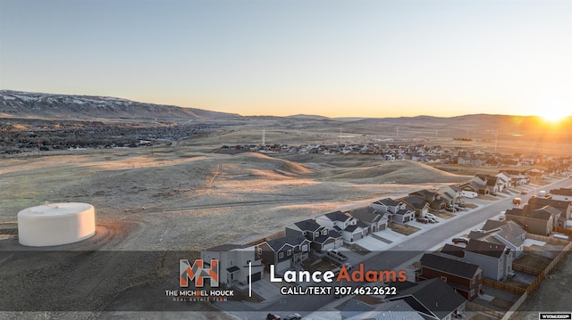 aerial view featuring a residential view and a mountain view