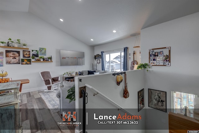 interior space featuring high vaulted ceiling, wood finished floors, and recessed lighting