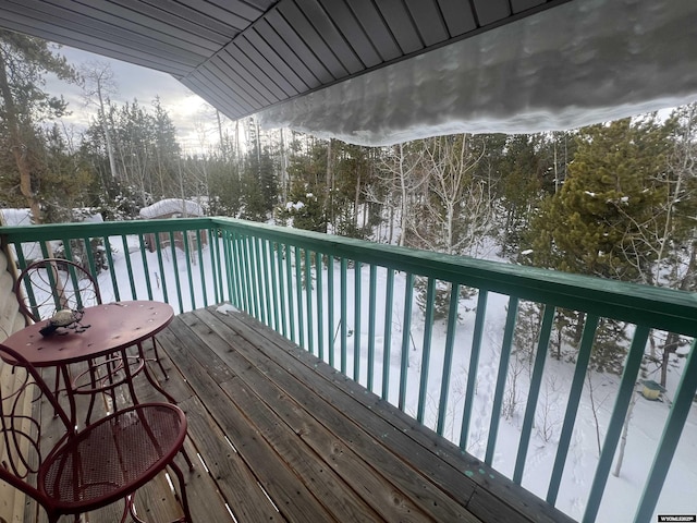 view of snow covered deck