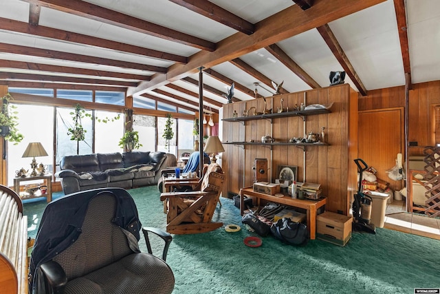 living room featuring vaulted ceiling with beams, wood walls, and carpet flooring