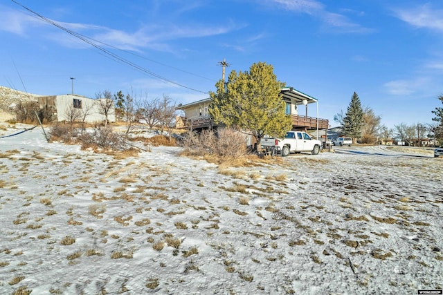 view of yard covered in snow