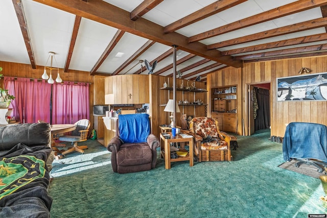 carpeted living room with vaulted ceiling with beams and wood walls