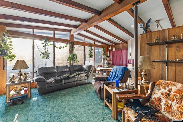 living room with lofted ceiling with beams and carpet