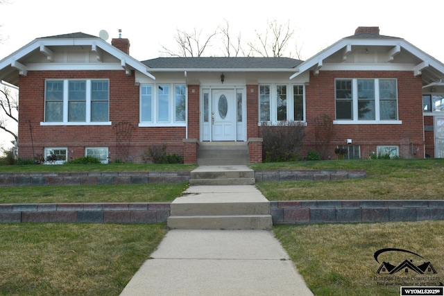 view of front of home with a front yard