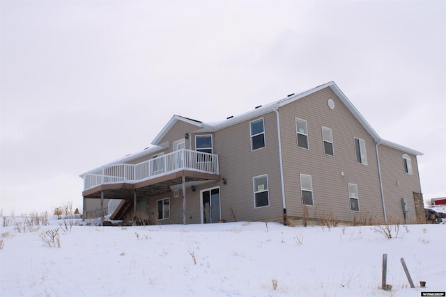 view of snow covered property