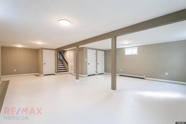 basement featuring a baseboard radiator